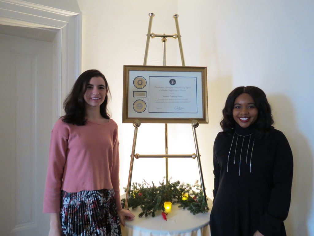 SOS participants Jessica Seidenberg and Courtney McCrimmon with the Presidential Award.